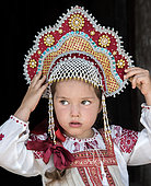 Little Russian girl in the city of Uglish in traditional dress