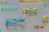 Cages with nets for raising fish in open sea, Fish Farming, cages under construction, Xiapu County, Fujiang Province, China