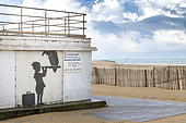 Fresco of the artist Banksy realized on the rescue station of the beach of Calais, Hauts-de-France
