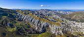 View from Los Machucos o Colláu Espina, Located at 921 metres (3,022 ft) above sea level and communicates the villages of Bustablado and San Roque de Riomiera. Valles Pasiegos, Cantabria, Spain, Europe