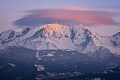 Pink lenticular cloud on the Mont Blanc at the very end of the day, Alps, France, January 25, 2019.