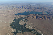 Dam lake and irrigated crops downstream. Southern Morocco