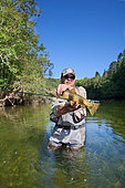Fly fishing on the Loue river, Presentation of a wild trout (Salmo trutta fario), Franche-Comté, France