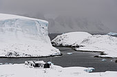 Wordie House, a British Antarctic Survey hut which was in use between 1947 and 1954 and is it now maintained by the Antarctic Heritage Trust as a museum. Winter Islands in the Argentine Islands, Antarctica.