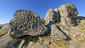 Erosion in crust of bread on granite, one of the symbols of the Geopark of Arouca, Portugal