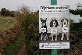 Information panel about dog excrement on the customs trail, GR 34 at Cap Fréhel, Brittany, France
