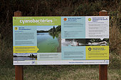 Information panel concerning the presence of cyanobacteria in the Rance river in Saint-Samson-Sur-Rance, Brittany, France