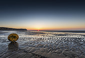Buoy at low tide on Sangatte beach, Hauts de France, France