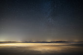 Sea of night clouds, lit by Aix-Les-Bains and Chambéry. During the marked reversal of December 04, 2019, Savoie, France