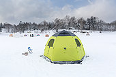 Fisherman's tent on frozen Shumarinai lake in Hokkaido, Japan