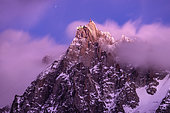 Aiguille du Midi and stratus at dusk. Shot of February 2020, from Les Houches, Haute-Savoie, France