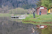 Fly fishing in a reservoir, Moselle, Lorraine, France