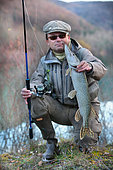 Pike fishing with artificial lure, Presentation of a Pike (Esox lucius), Doubs, Franche-Comté, France