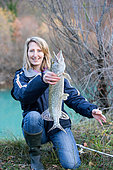 Pike fishing with artificial lure, Presentation of a Pike (Esox lucius), Doubs, Franche-Comté, France