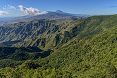 Landscape of the Anaga peninsula, on the island of Tenerife in the Canaries. on the horizon, the Teide volcano - The high slopes of the ravines are covered with Lauraceae forests - Parque Rural de Anaga - Tenerife - Canary Islands