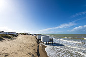Beach cabins invaded by the sea, during high tides, Sangatte, Pas de Calais, France