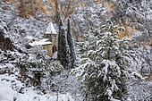 Chapel of Notre-Dame de Beauvoir from the 13th century during a snowfall, Moustiers-Sainte-Marie, labeled Les Plus Beaux Villages de France, regional natural park of Verdon, Alpes-de-Haute-Provence, France