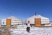 Yurt in the snow with a child, Altai mountains, West Mongolia, Mongolia