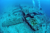 Divers around a plane wreck, Tañon Strait, Moalboal, Cebu, Philippines