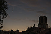 The comet NEOWISE Thursday, July 9, 2020, rising above the village of Vouvant, in the South Vendée. The only remaining fortified town or village in the Vendée, it is one of the most beautiful villages in France, and a village of painters. France