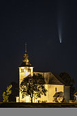 Comet Neowise, meteorite, and Notre-Dame-de-l'Assomption church of Mont-Saxonnex, Haute-Savoie, July 13, 2020 in the late night, France