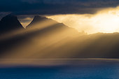 Island of Moorea in the sunset and rays of light, French Polynesia