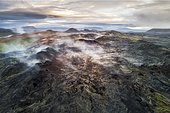 Aerial view of the steaming Krafla lava field with colorful rocks, Skútustaðir, Norðurland eystra, Iceland, Europe