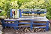 Garden bench made with recycled pallets, spring, Pas de Calais, France