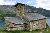Chapel on the shores of the lake of the Roselend dam, Haute Savoie, Alps, France