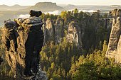 View of the Bastei with Wehlnadel and Wehlgrund to the Lilienstein at sunrise, Saxony, Germany, Elbe Sandstone Mountains, Saxon Switzerland National Park, Europe