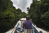 Boat trip on Mpivie river, Gabon, central Africa