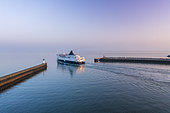 Ferry leaving the port of Calais at dawn, Côte d'Opale, Hauts-de-France, France