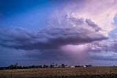 Storm over Chartres. Heat storm over the Chartres area in the late evening. Thunderstorm with a high base called free atmosphere. Centre-Val de Loire, France