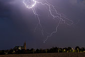 Storm over Chartres. Heat storm over the Chartres area in the late evening. Thunderstorm with a high base called free atmosphere. Centre-Val de Loire, France