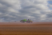 Chemical treatment of crops with very wide spreading behind a tractor, field crops, agricultural territories, Senlis region, Department of Oise, France