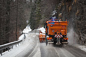 Snow plough in winter, on a road in the Jura, La Pesse, France