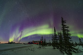 March, 18, 2020 - A pastel-coloured aurora over the Rocket Range Road and Northern Studies Centre in Churchill, Manitoba, Canada. 
