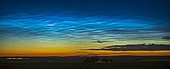 July 2, 2020 - A display of the bright and extensive noctilucent clouds across the north, from southern Alberta, Canada. Capella is at right.