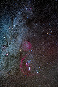 Orion and Taurus (at top) beside the Milky Way, with Betelgeuse dimmer than usual at this time (about magnitude +1.3) during one of its fading episodes. The Taurus Dark Clouds are at top. Barnard’s Loop, apparently now thought to be a supernova remnant and not a bubble, is at lower left encircling Orion. The Rosette Nebula is at far left. The Auriga clusters and nebulas are at top, as is M35 in Gemini. 
