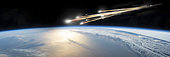 A meteor streaks towards a collision with Earth as it breaks up over the ocean. Clouds cover an ocean area of the planet.