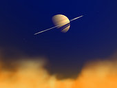 Artist's concept of Saturn amongst the hydrocarbon haze of its moon Titan. Saturn and its rings would be a majestic sight lording over Titan's hydrocarbon haze. The viewpoint is from 50 miles above Titan's surface and three-quarters of a million miles away from Saturn itself. Three of Saturn's smaller satellites can also be seen extending from the ring plane; to the left of Saturn is Enceladus, and to the right are Tethys and Rhea. . Technically, the orange clouds mark the beginning of Titan's condensate haze, which consists of ethane, methane, nitrogen, and a variety of hydrocarbons known collectively as tholin. These gases and hydrocarbons extend upward another 250 miles, resulting in a bluish, earth-like sky, albeit darker due to Titan's great distance from the Sun. Tholin is created by the interaction of the nitrogen-rich gases with ultraviolet light from the Sun and ultimately precipitates all the way down to Titan's surface. Notwithstanding its flame-like colors, this haze is chilled to minus 330º F.