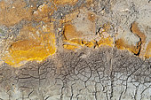 Detail at the shore of the Río Tinto (Red river). Its colour is caused by oxidised iron minerals. Aerial view. Drone shot. Huelva province, Andalusia, Spain.
