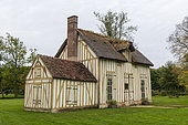 Thatched cottages of the Hameau de Chantilly in autumn, Oise, France