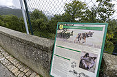 Information panel overlooking a wildlife park where it is possible to observe captive-born and injured Italian wolves in the village of Civitella Alfedena, Abruzzo National Park, Italy