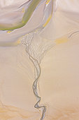 Traces laissées sur le sable par la mer, lors de son retrait à marée basse, Baie de Somme, France