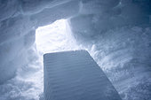 Snow block at the entrance of an igloo for 5 people and finished from the inside, Vercors, France