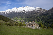 Chalet and view of the valley and the village of Lanslebourg as well as the Mont Cenis pass on the border with Italy, Haute Maurienne, France