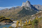 Tena Valley: La Peña Foratata ( 2327m ), overlooking the reservoir and the village of Lanuza, Aragonese Pyrenees, Huesca, Spain