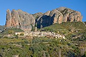 The Mallos de Agüero overlooking the village of Aigüero, an area with important colonies of vultures, Aragonese Pyrenees, Huesca, Spain