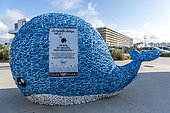 Recycling plastic bottles in a whale-shaped container, Calais, France